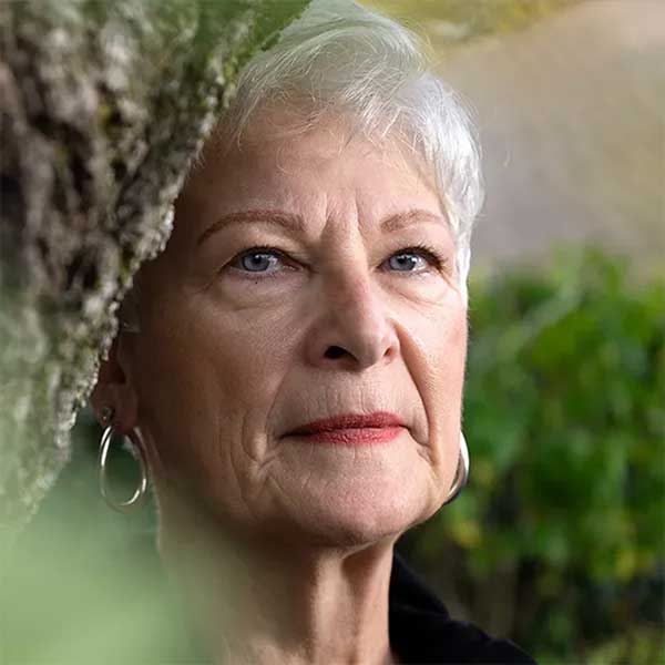 Image of Lori, real CREXONT patient.