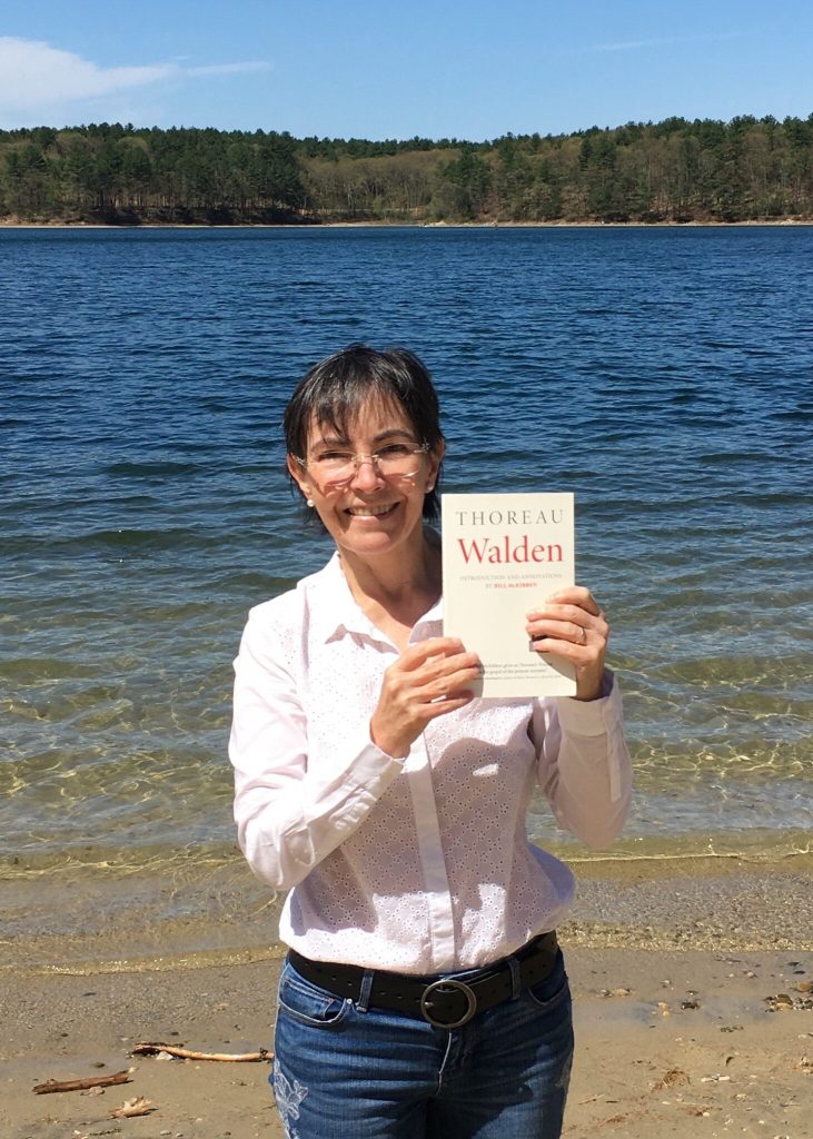 Image of real CREXONT patient Laura enjoying time at Walden Pond.