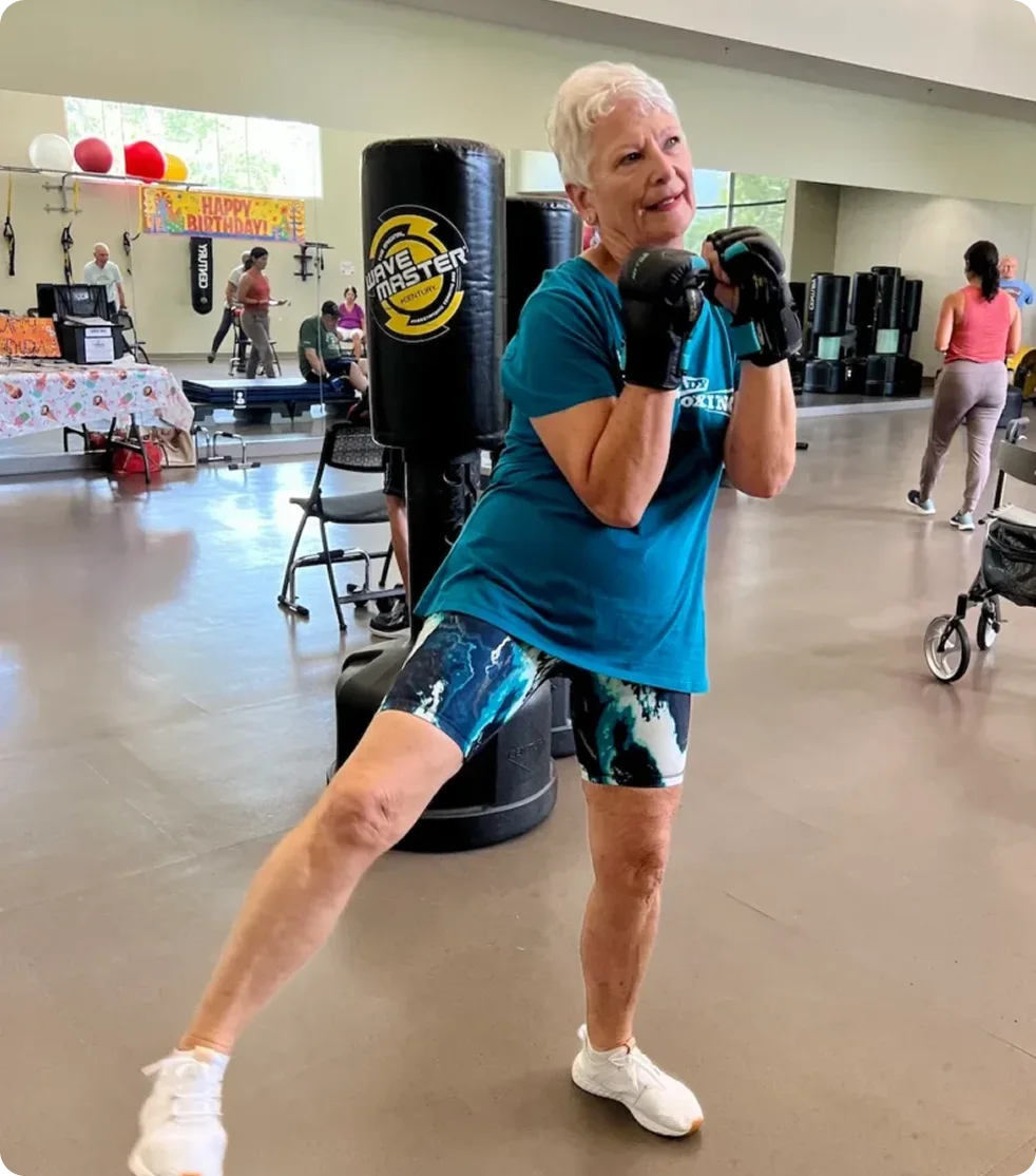 Image of Lori at an aerobics class.